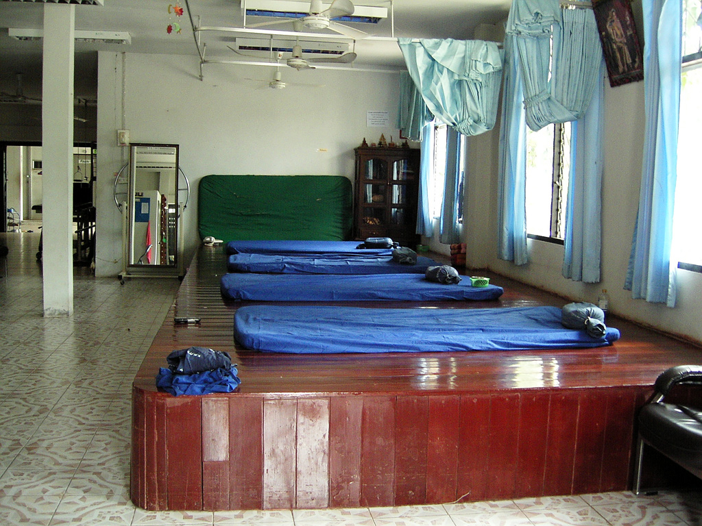 Traditional Thai massage room with mats on a raised wooden platform at Kap Choeng Hospital in Surin Province Thailand